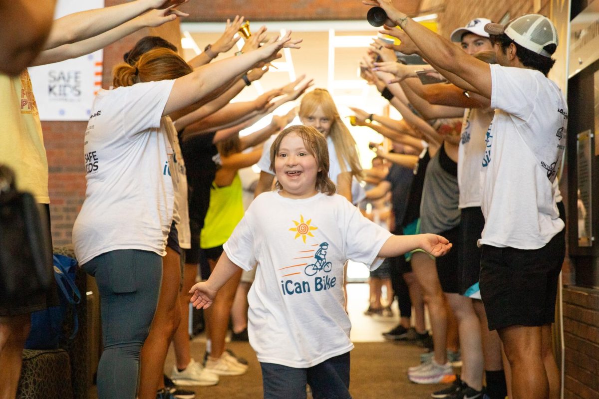 WSU students volunteer at bike-riding camp for people with disabilities